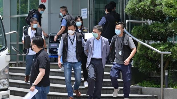 Miembros del Apple Daily detenidos 