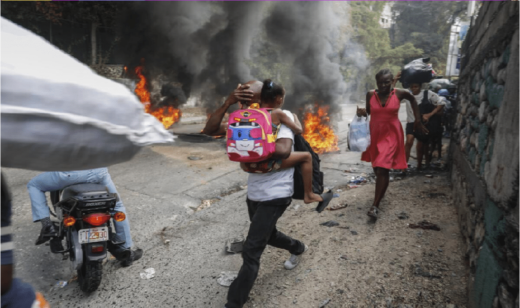 Bandas atacan edificios Gubernamentales en Haití.png1