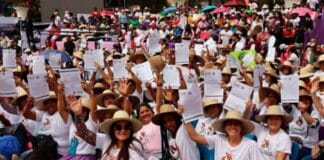 títulos tierras mujeres conuqueras