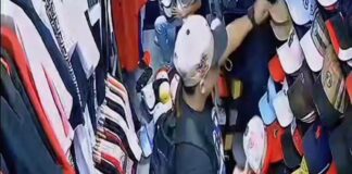 sujeto robando gorras Caracas