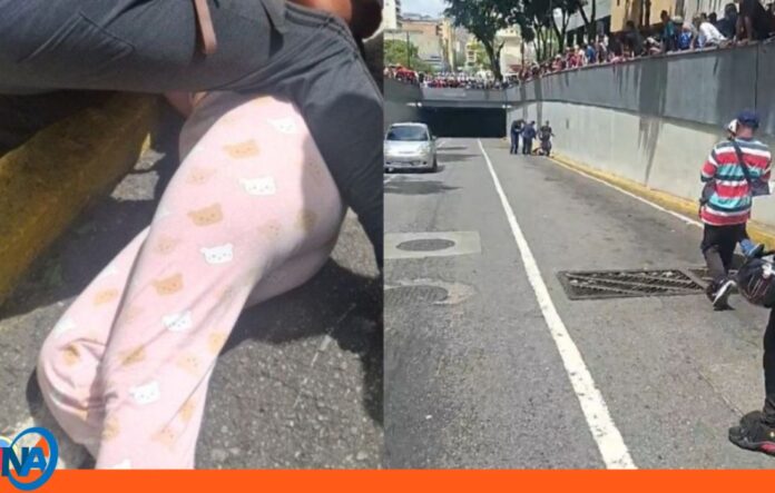 Réplica Caracas caída mujer un muro